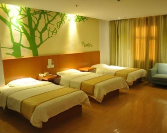 Vatica Heze Mudan Road Shangri-La Square Hotel - Heze - Спальня