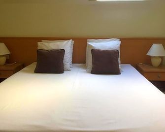 B&B Bloemenweelde - קורטרייק - חדר שינה