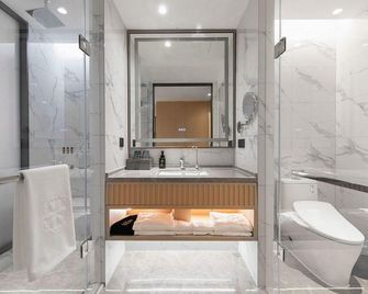 Xuzhou Kanai Garden Hotel - Xuzhou - Camera da letto