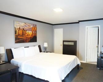 Central Motel Courtyard - White Plains - Habitación