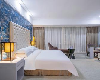 Berlin International Hotel (Dongguan Wanda high-speed railway station, Humen) - Dongguan - Schlafzimmer