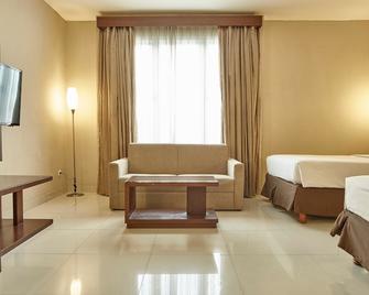 Triniti Hotel Jakarta - Jakarta - Schlafzimmer
