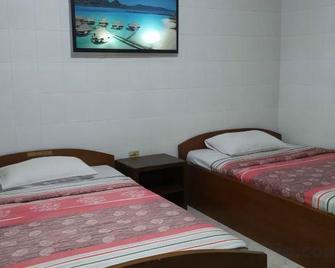 Hotel Bismo - Kediri - Slaapkamer
