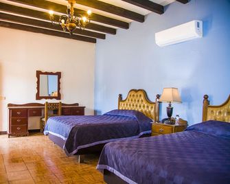 Hotel Cosmos Don Carlos - Мексікалі - Спальня