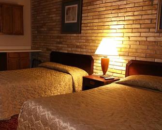 Executive Inn and Suites Waxahachie - Waxahachie - Schlafzimmer