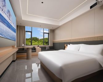 Histon Smart Hotel (Wanning Municipal Government Branch) - Wanning - Slaapkamer