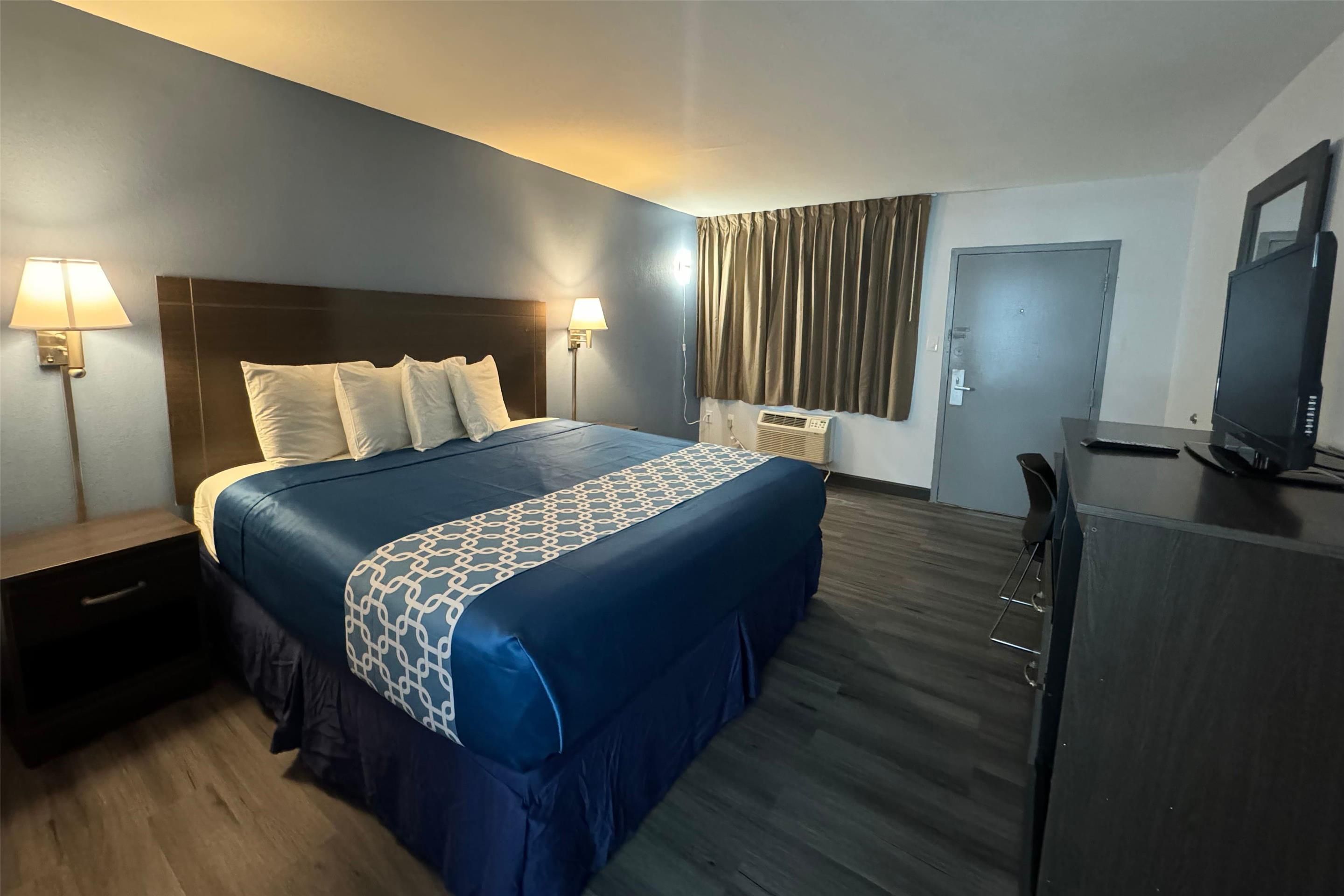 Travelodge by Wyndham Gainesville - גיינסוויל - חדר שינה