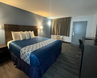 Travelodge by Wyndham Gainesville - גיינסוויל - חדר שינה