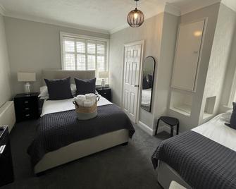Grosvenor Lodge Guest House - Christchurch - Schlafzimmer