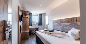 Binders Budget City-Mountain Hotel - Innsbruck - Makuuhuone