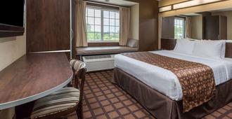 Microtel Inn & Suites by Wyndham Jacksonville Airport - Jacksonville - Bedroom