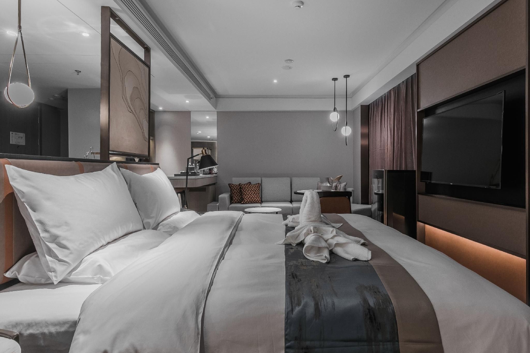 Qingdao Treasure Hotel - צ'ינגדאו - חדר שינה