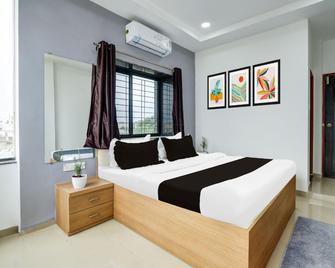 Hotel O Ns Premium - Nagpur - Schlafzimmer