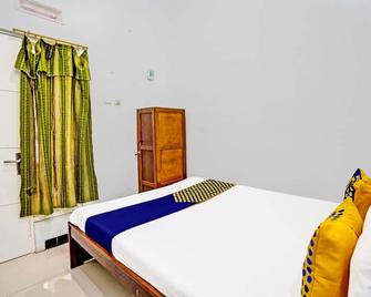OYO 93850 Njy House Syariah - Пеканбару - Спальня