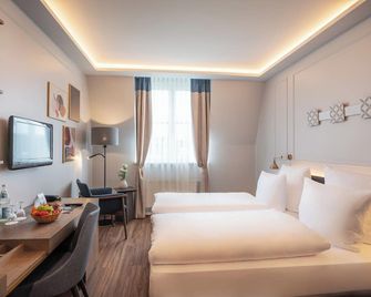 Seetelhotel Pommerscher Hof - הרינגסדורף - חדר שינה