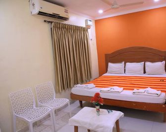 Ferdin Home Stay - Kanyakumari - Спальня