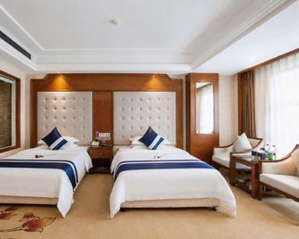 Xiaoxiang Binhu Hotel (Yongzhou Economic Development Zone North Bus Station Branch) - Yongzhou - Bedroom