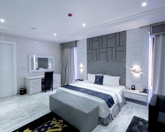 The Wells Carlton Hotel And Apartments - Abuja - Bedroom