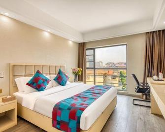 Jiangzhiyun Hotel - Xishuangbanna - Bedroom