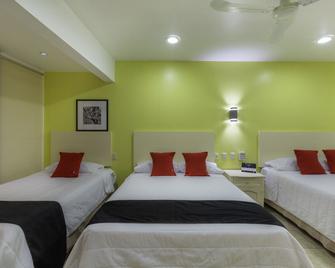 Capital O Oaxaca Guest Hotel - Oaxaca - Bedroom