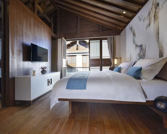 House Boss Resort Hotel Lijiang - Lijiang - Chambre