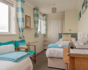 Trevarrian Lodge - ניוקי - חדר שינה