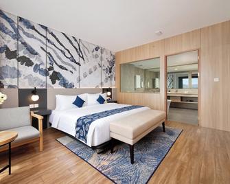 Aston Palu Hotel & Conference Center - Palu - Bedroom