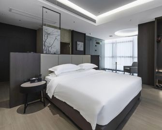King Coziness Hotel - Yiyang - Slaapkamer