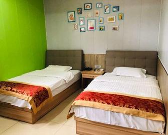 Jiayuan Inn - Jincheng - Ložnice