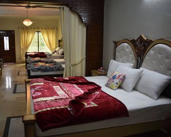Neelum Guest House - Islamabad - Camera da letto