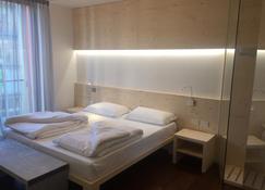 Komodo short stay apartments - Trento - Bedroom