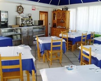 Hospedaje El Marinero - Isla - Restaurante