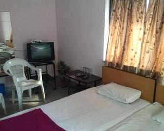 Capital Guest House - Kolkata - Bedroom