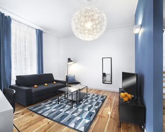 Apartamenty Pomaranczarnia - Poznan - Living room