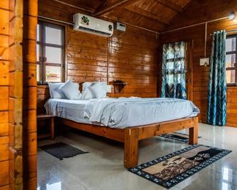 Leo wooden resorts - Conjunto Monumental de Hampi - Quarto