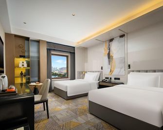 Shuiyi Boqing Hotel - Heze - Camera da letto