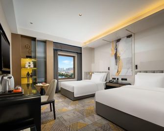 Shuiyi Boqing Hotel - Heze - Спальня