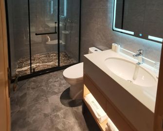 Jianan Hotel - Harbin - Slaapkamer