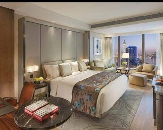 Hotel Mukund Inn - Ahmedabad - Bedroom