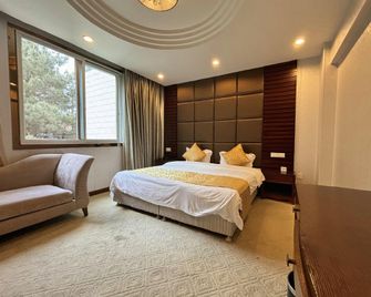 Dexin Resort Hotel - Chongqing - Schlafzimmer