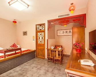 Xing Sheng Jiu Hotel - Jinzhong - Bedroom
