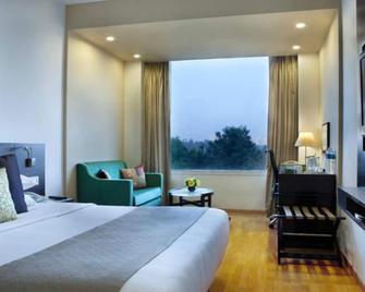 Lemon Tree Hotel, Vadodara - ואדודרה - חדר שינה