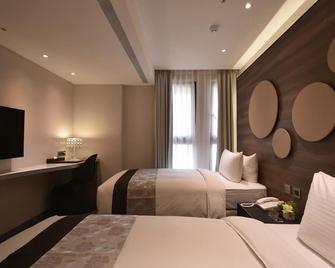 Green World Hotel Songshan - Taipei City - Bedroom
