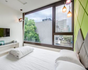 lightness Station Inn - Tainan - Sovrum
