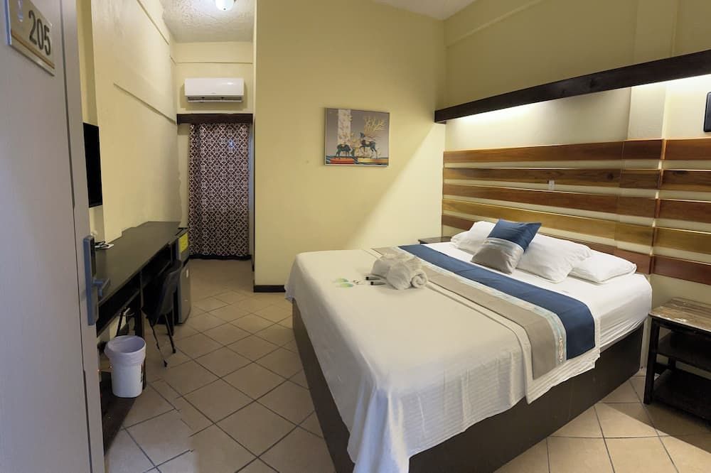 Sky Inn - Caye Caulker - Bedroom