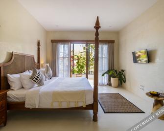 White Goose Boutique Hotel - North Kuta - Sovrum