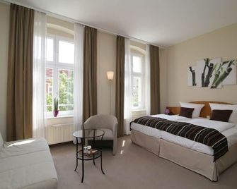 Gut Hotel Stadt Beelitz - Beelitz - Schlafzimmer