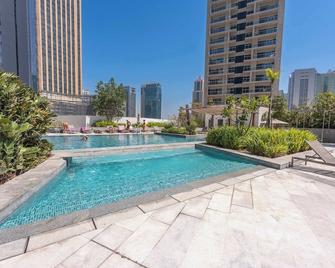 Contemporary 2-Bedroom Apartment in Silverene - Garhoud - Pool