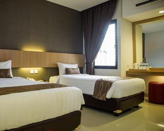Dcozie Hotel By Prasanthi - Jakarta - Phòng ngủ