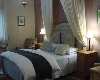 Die Waenhuis Guest House - ג'ורג' - חדר שינה